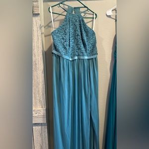 Beautiful neckline, color is more of a soft blue, not altered and not worn